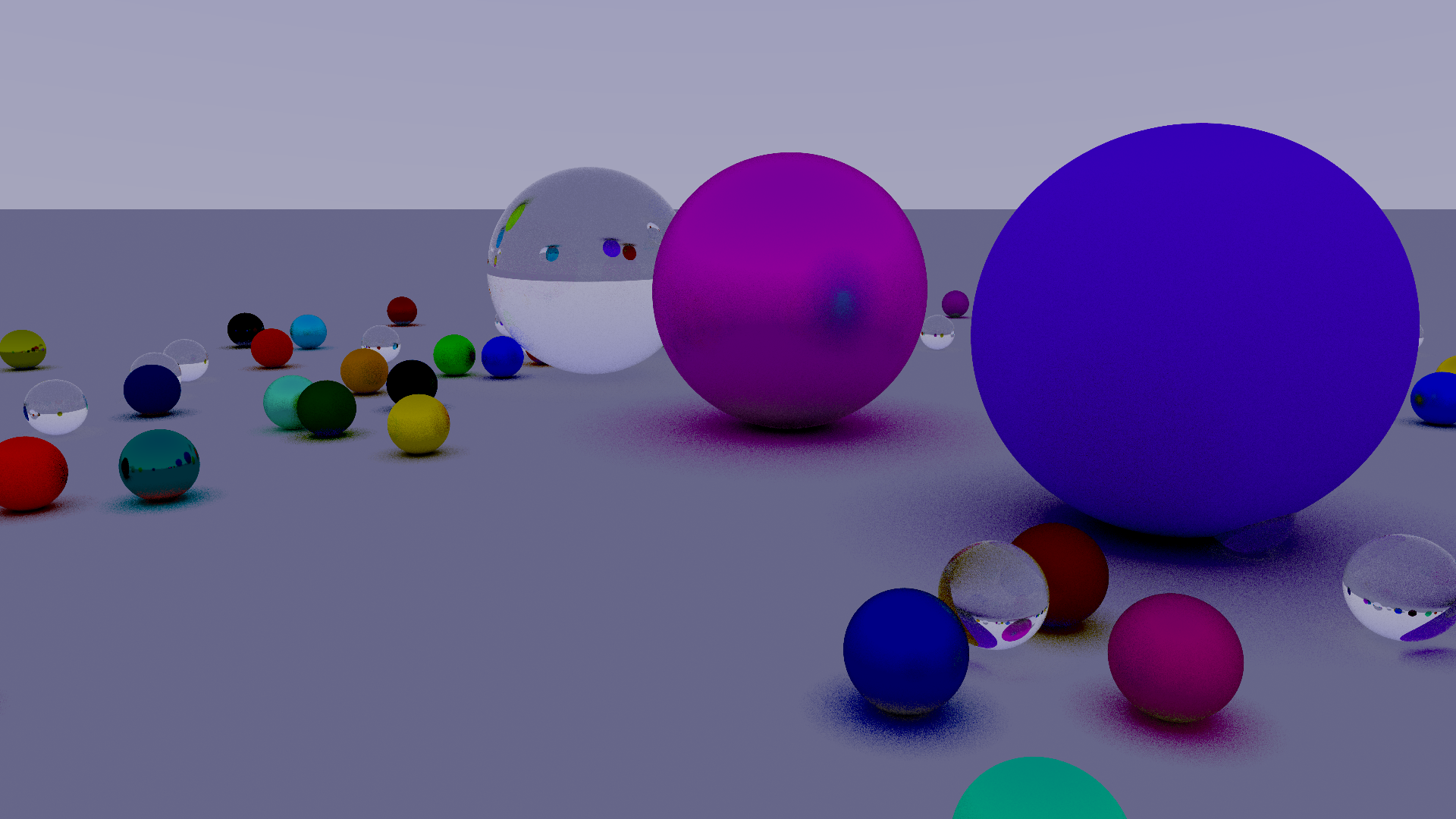 A rendered scene, matching that on the cover of the ray tracing in one weekend book